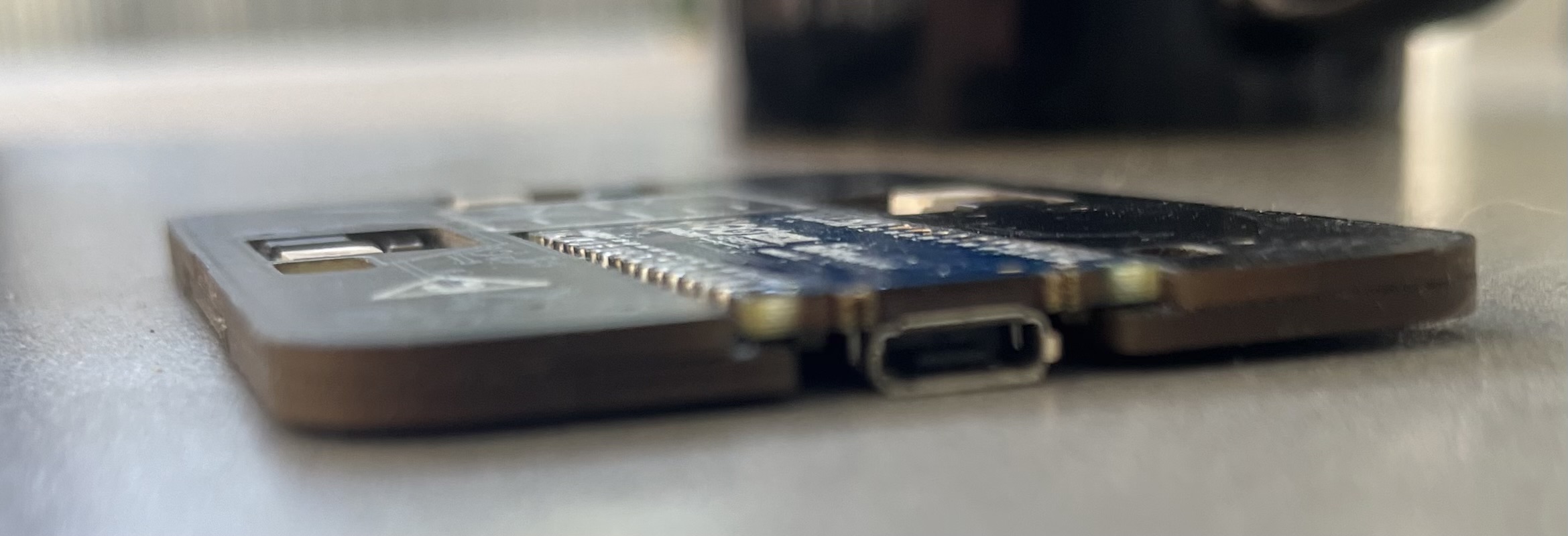 Zero-profile business card PCB sandwich, side view